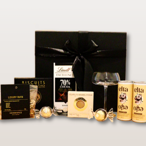 Espresso martini gift box NZ with alcohol-free espresso martini, gourmet chocolate, savoury biscuits, luxury nuts, and gin glass