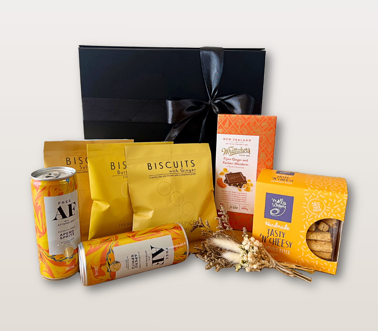 Golden Hour Gift Box NZ with alcohol-free Aperol Spritz, artisan chocolate, biscuits, savoury bites, and dry flower bouquet
