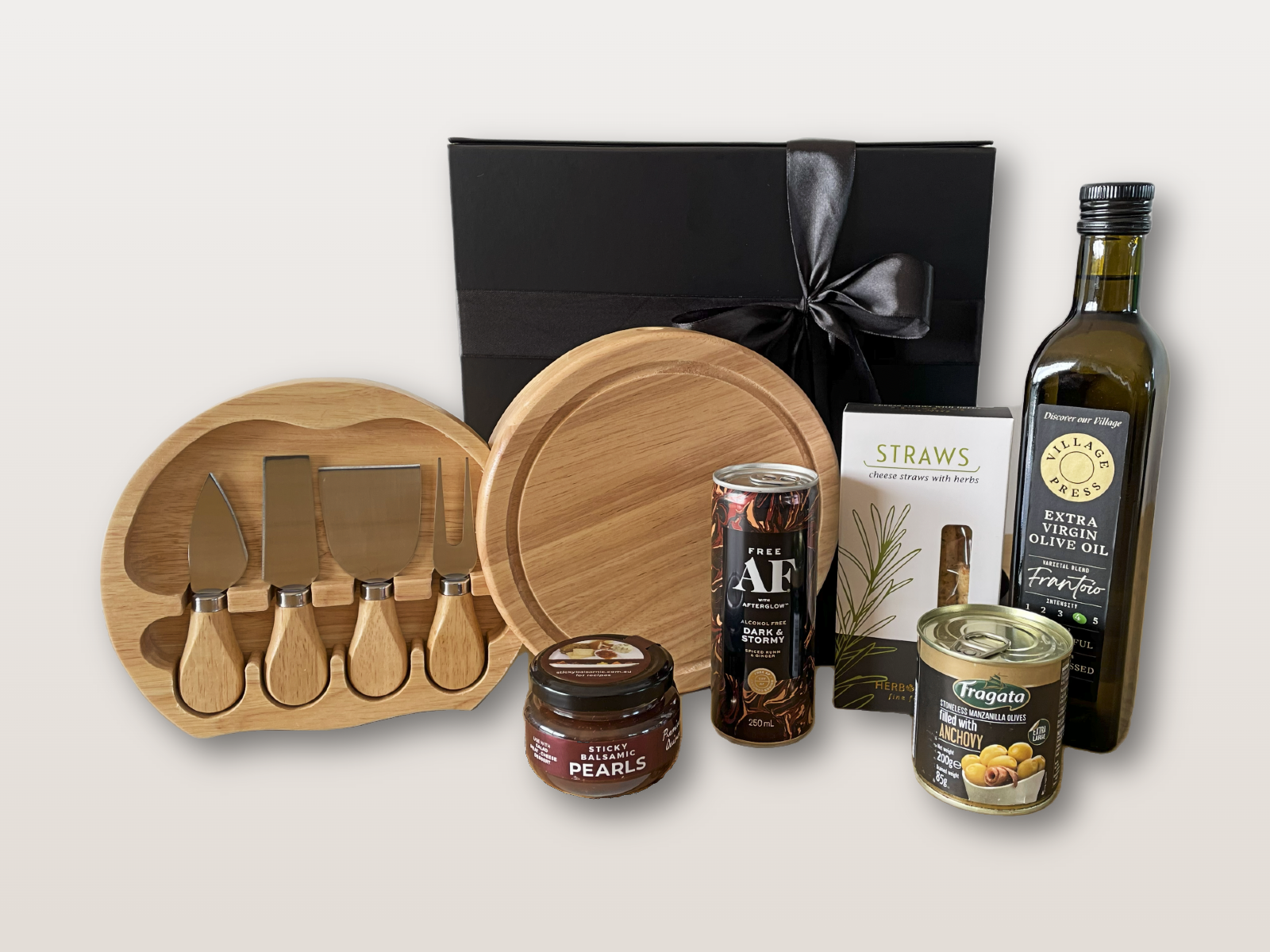 Conversations Gift Box NZ with olive oil, fig balsamic pearls, cheese board kit, and alcohol-free Dark & Stormy