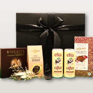 Margarita Sunset gift box with alcohol-free passionfruit margaritas, Whittaker’s chocolate, fudge, cumin biscuits, and dry flower mini bouquet.