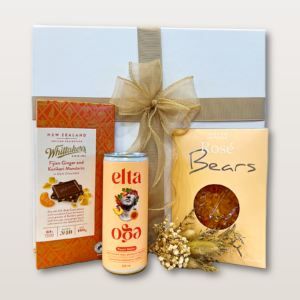 Petit Bellini Gift Box NZ with alcohol-free Peach Bellini, Whittaker’s chocolate, pink rosé Bubbly Bears, and dry flower mini bouquet